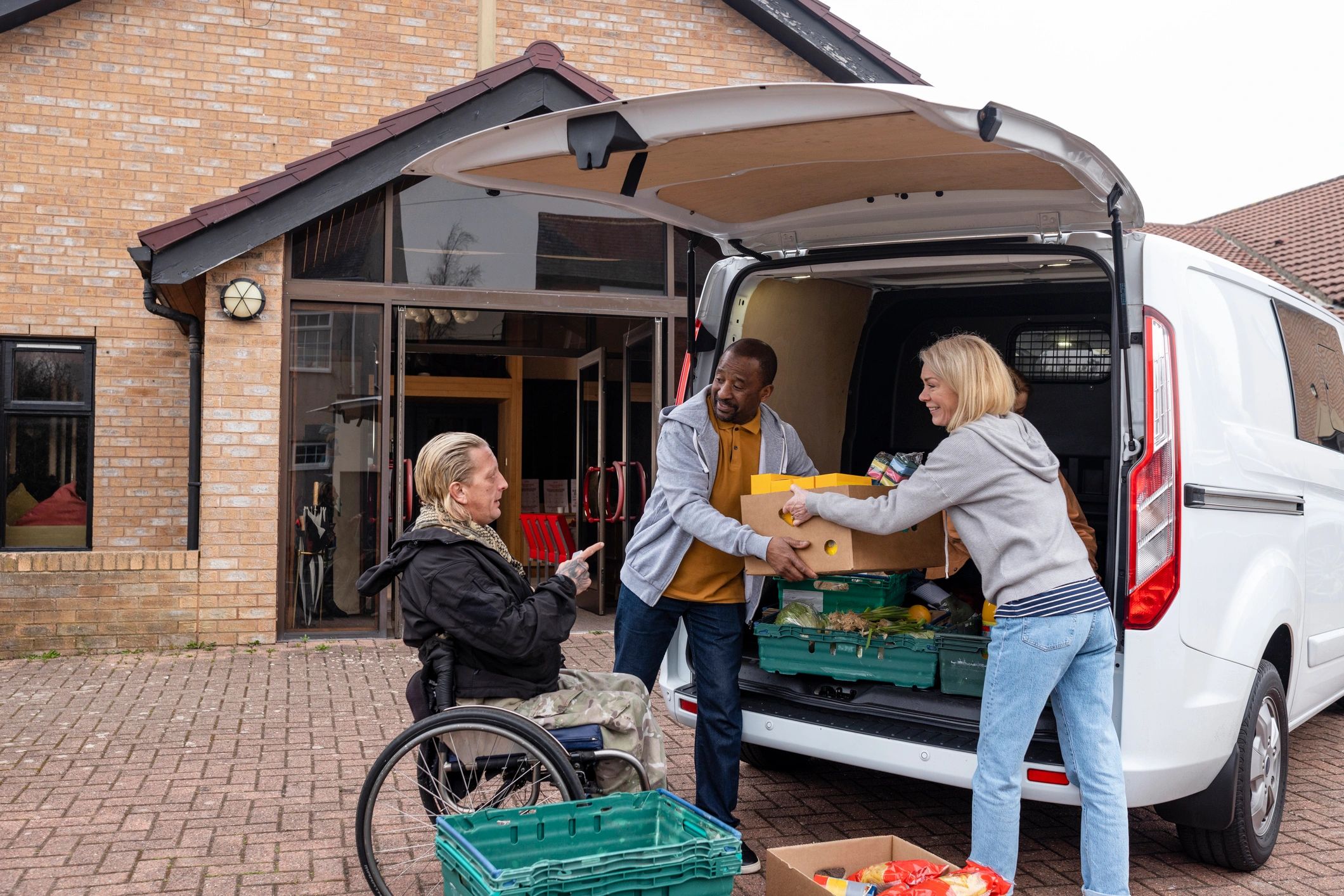 People working together in a community support setting
